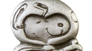 A Silver Snoopy Pin which are awarded by astronauts to staff as part of the Space Flight Awareness Awards.