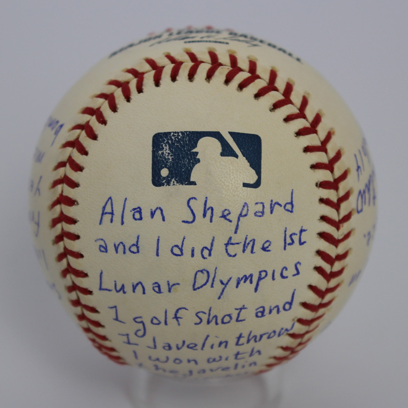 Baseball written on and signed by Edgar Mitchell, Apollo 14 astronaut.