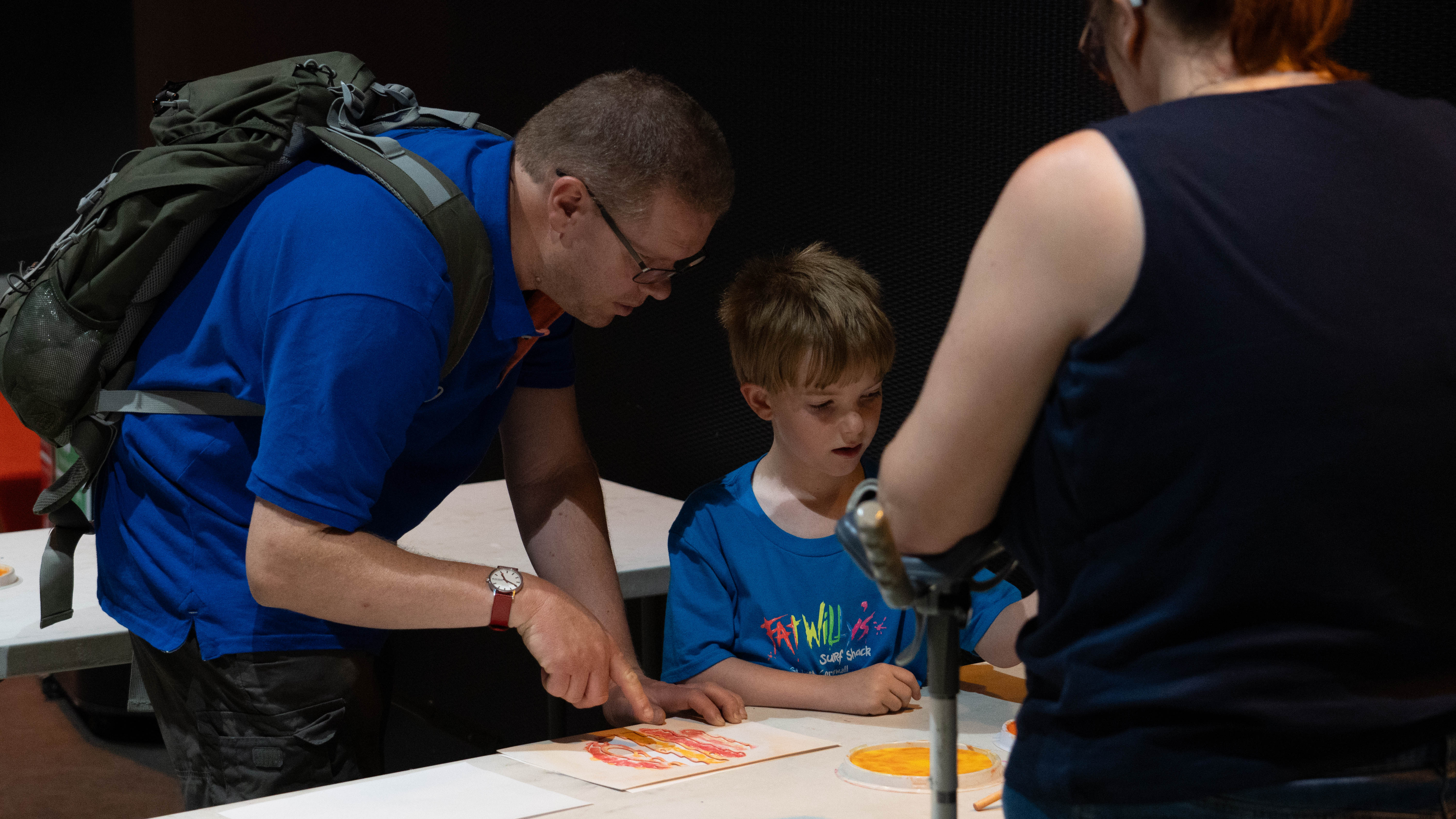 Family participating in a workshop at Accessible Afternoon