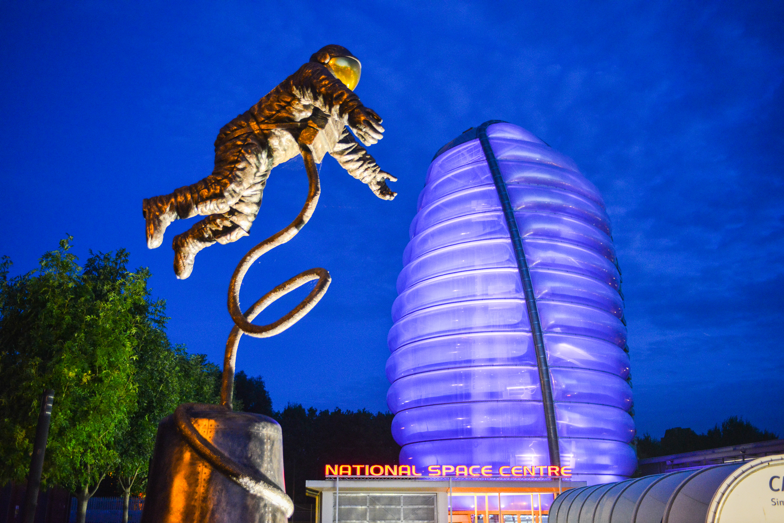 Rocket Tower and astronaut statue early evening