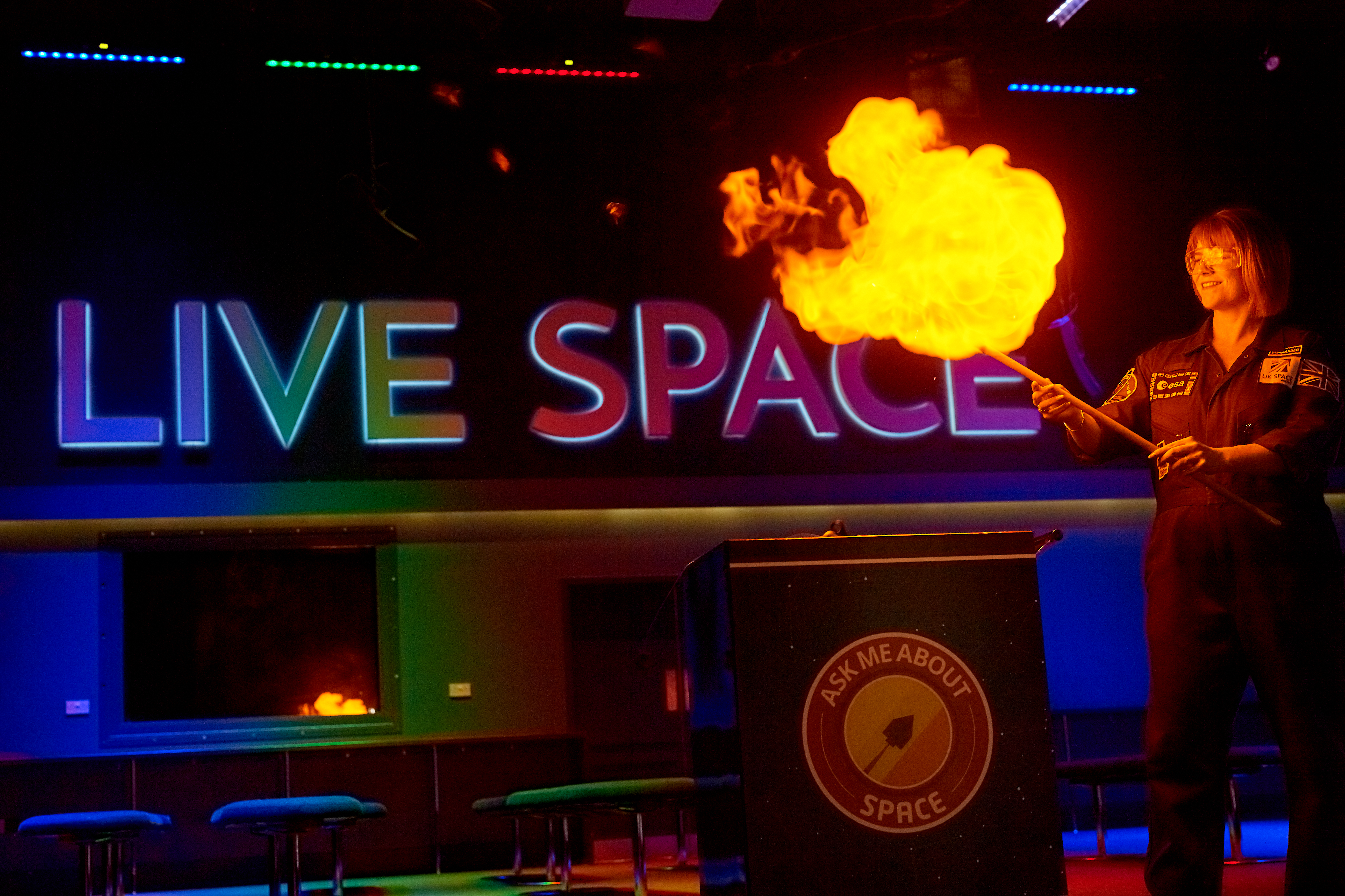 LIVE Space logo with large fireball as part of a science demonstration