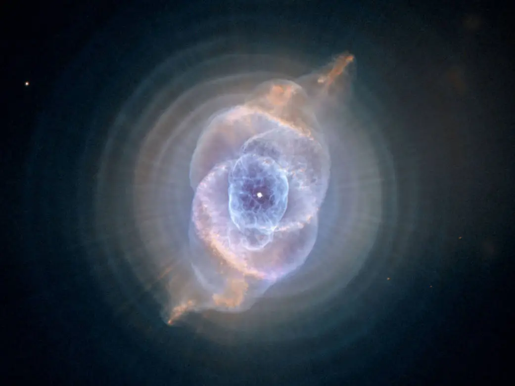 The full beauty of the Cat's Eye Nebula (NGC 6543) is revealed in this new, detailed view from NASA's Hubble Space Telescope. The image from Hubble's Advanced Camera for Surveys (ACS) shows a bull's eye pattern of eleven or even more concentric rings, or shells, around the Cat's Eye.