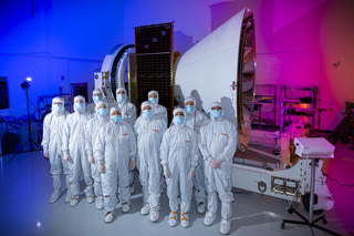 The SPHEREx integration and test team (BAE/JPL) in front of the spacecraft. 