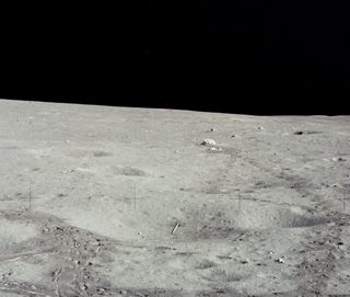 Image Of Golf Ball And Javelin Resting In Javelin Crater Below The Lunar Horizon. Credit NASA