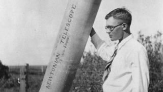 Clyde W. Tombaugh with his homemade 9-inch telescope