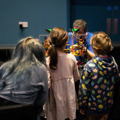 Family looking at a LEGO exhibition piece at the Brickish Weekend