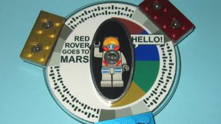 DVD LEGO assembly attached to each lander of Spirit and Opportunity.
