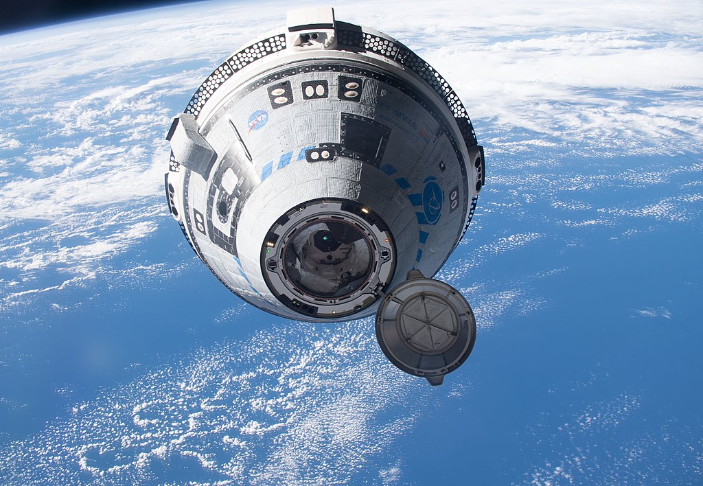 Starliner Spacecraft approaching the International Space Station. 