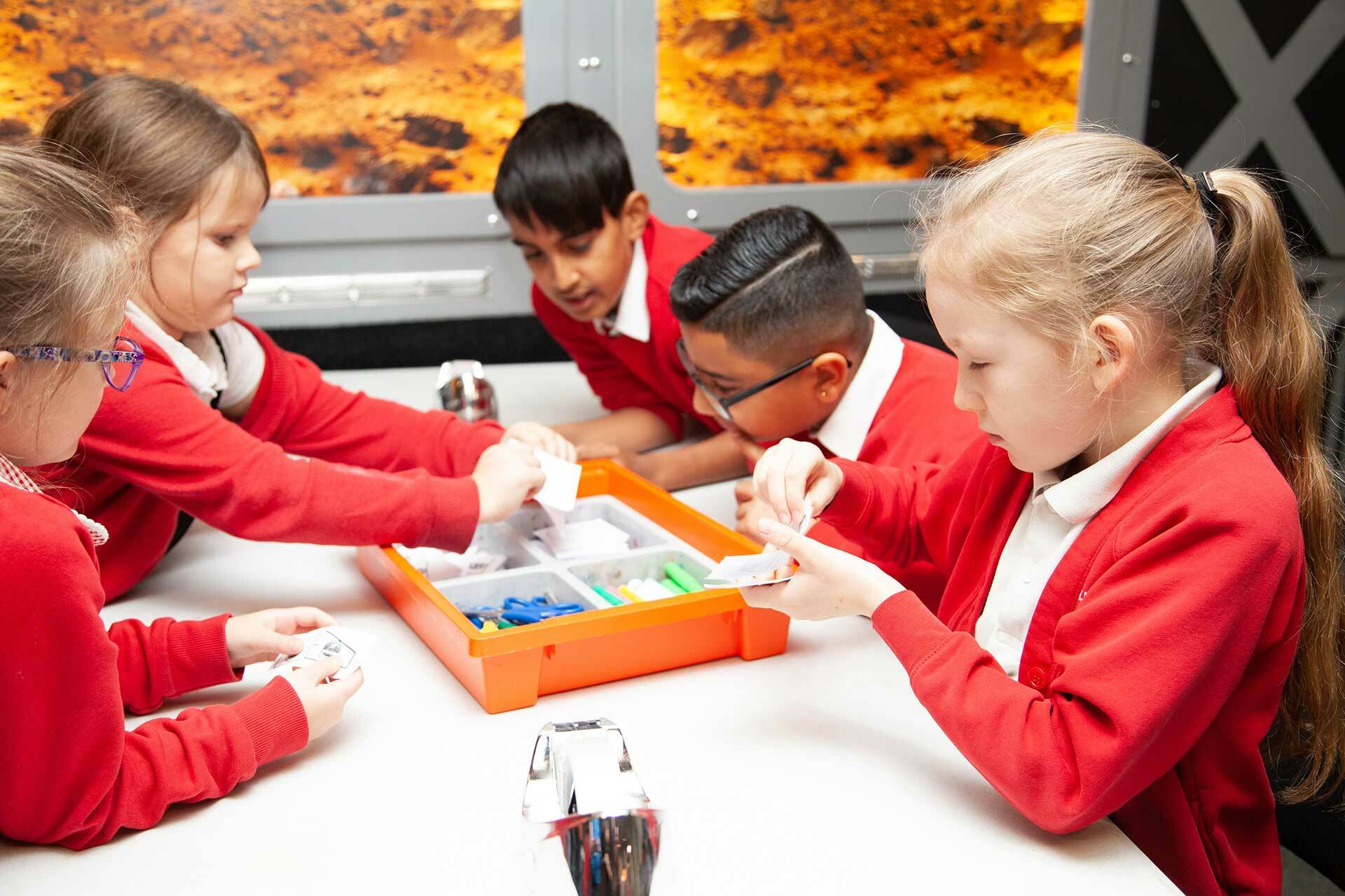 Primary School children participating in a craft activity.