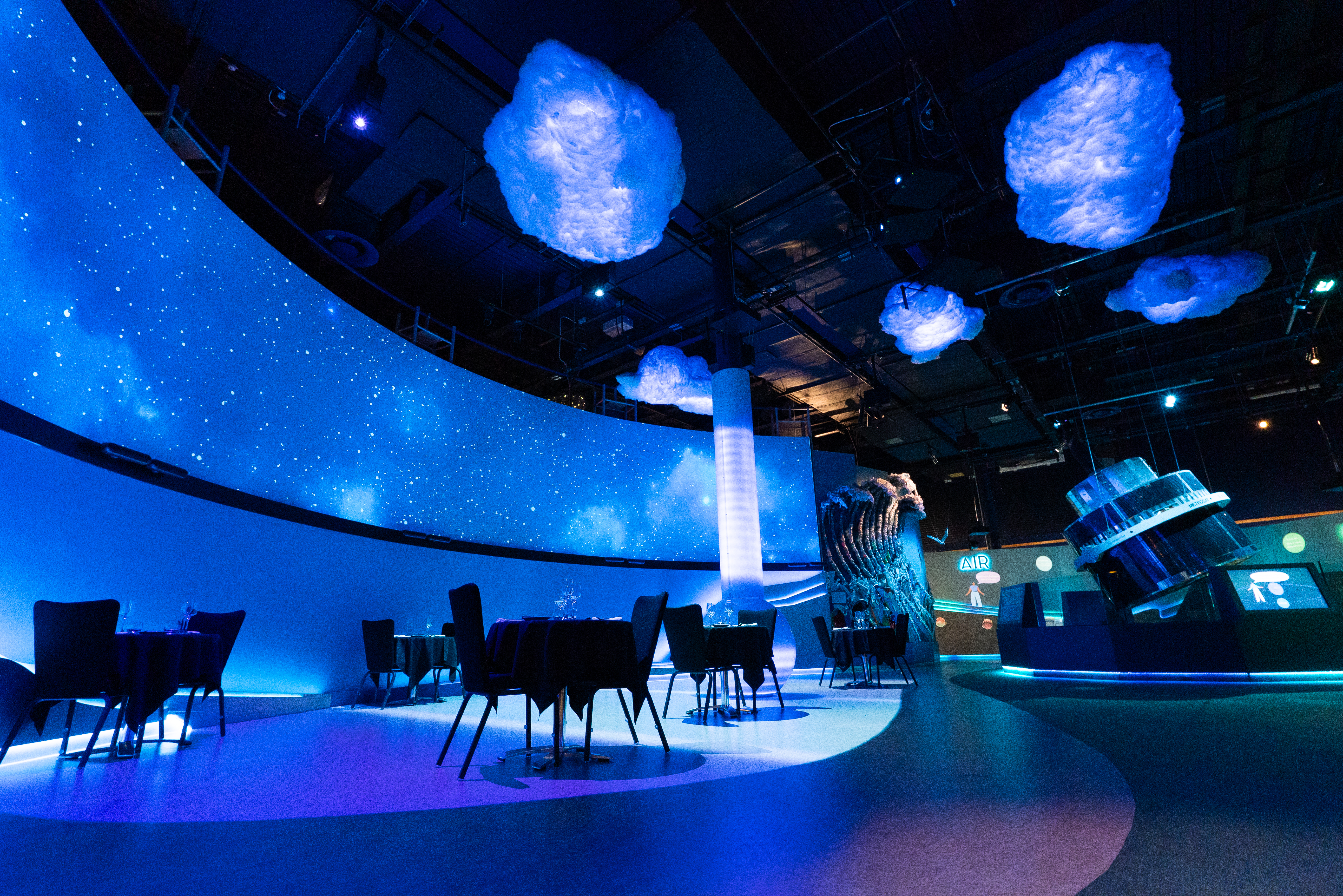 Home Planet set with tables close up for Destination Dining