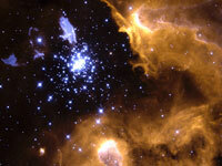 A nebula is in the foreground, with a cluster of stars seen in the background.