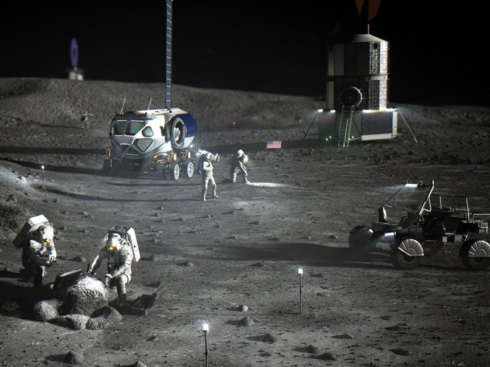 An artist’s rendering of astronauts working near NASA’s Artemis base camp, complete with a rover and RV.