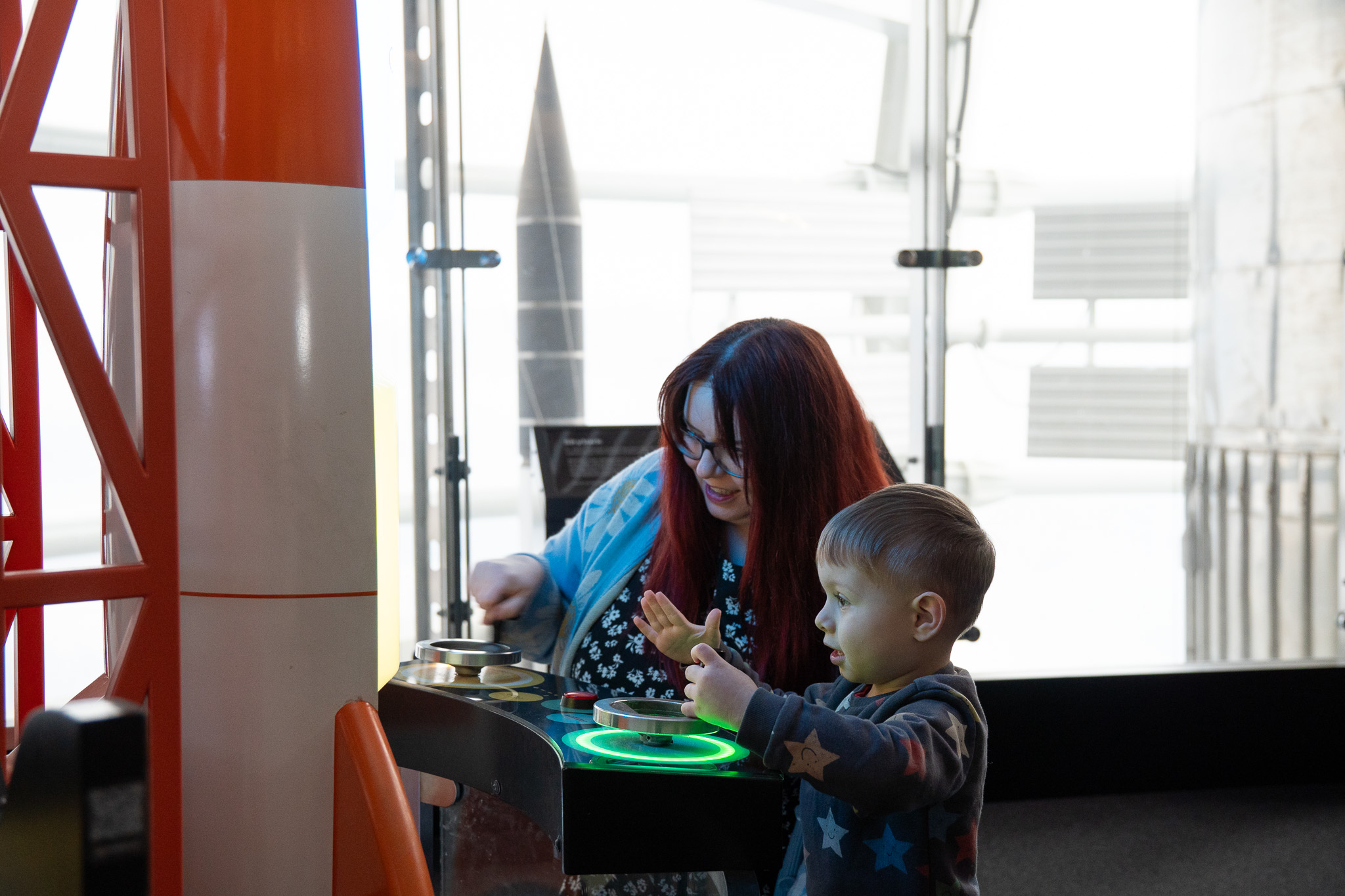 Young child and mother in the Britain's Space Race exhibition at Small Space Day