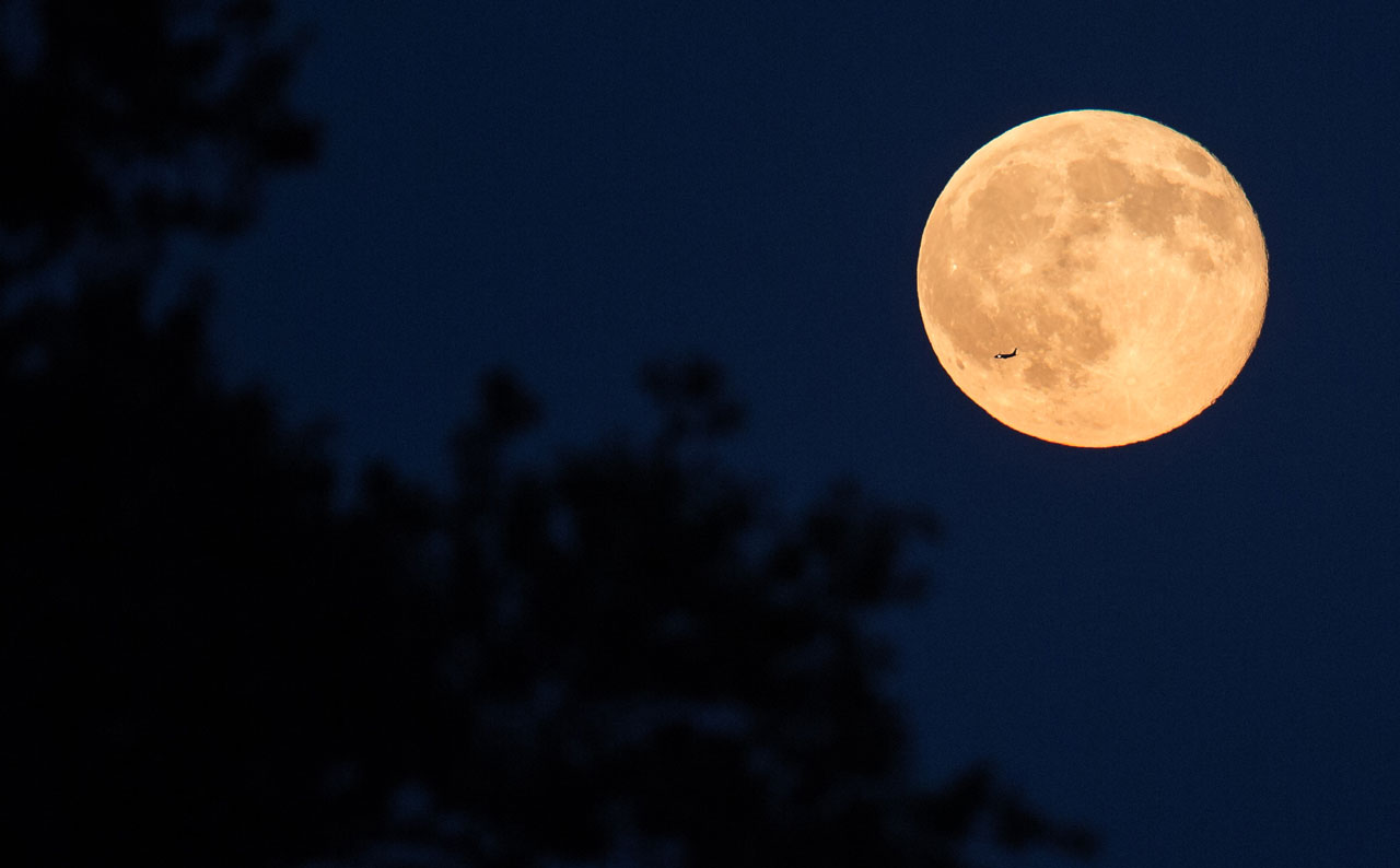 The third full moon in a season with four full moons is called a blue moon.